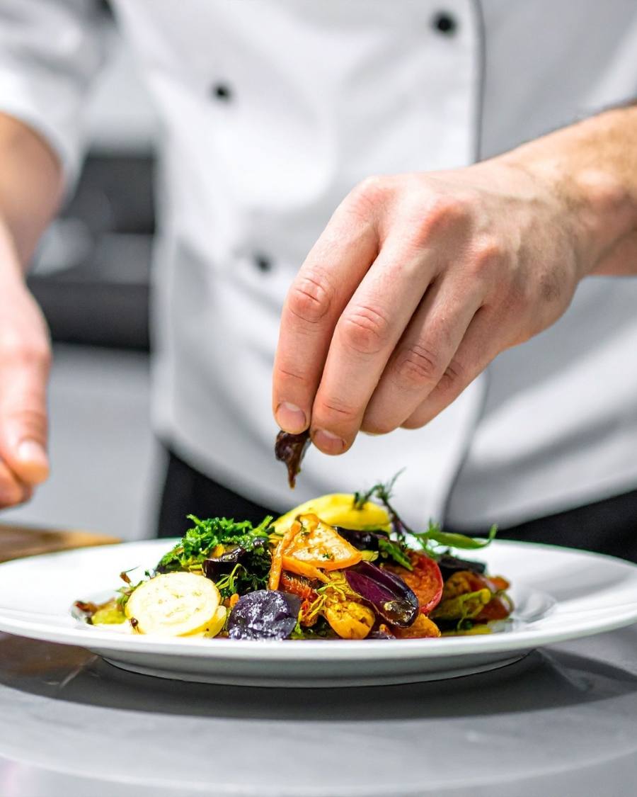 Chef plating a dish